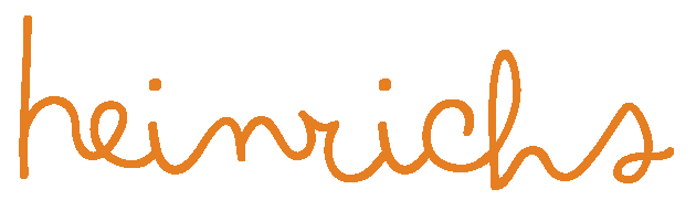 Dies ist das Schriftlogo des heinrichs in Paderborn in orange.